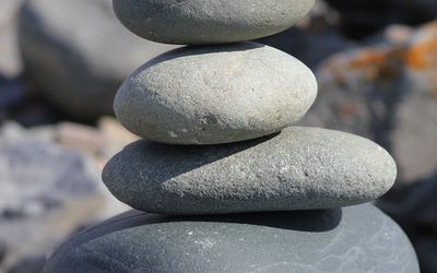 A collection of smooth stones stacked on top of each other.